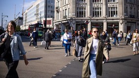UK economic growth revised lower as households saved more image